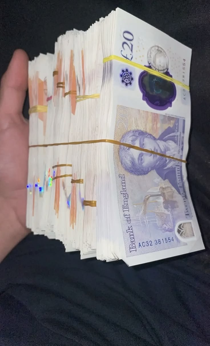 Bundles of £20 notes from reselling profits